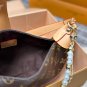 P125 gift box packagingLV Pochette Mia handbag from Louis Vuitton, featuring classic Mon_583