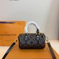 p125LV Speedy glitter limited edition pillow bag. This Retiro handbag is made of iconic