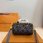 p125LV Speedy glitter limited edition pillow bag. This Retiro handbag is made of iconic