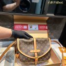 P130 (gift box packaging)The LV Saumur vintage Gemini messenger bag has been launched si