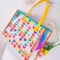 Small heart-shaped, colorful, laser-cut hand-held jelly bag