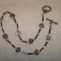 Black beads with silver toned hearts anklet