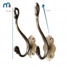 Antique brass clothes hanger
