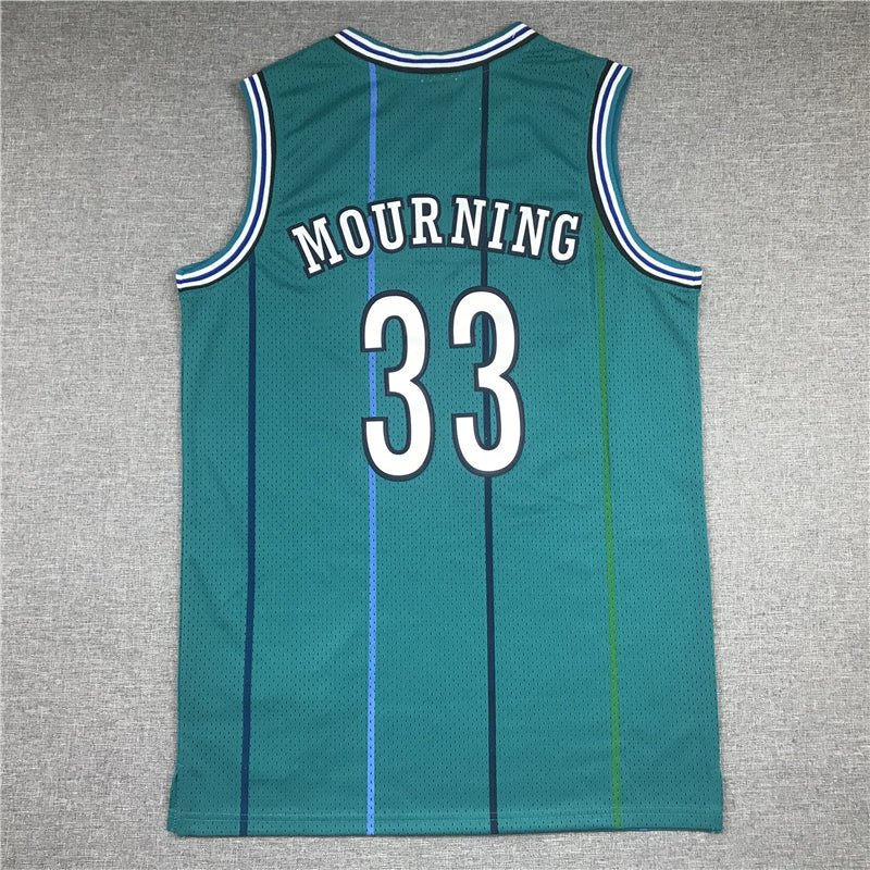 Alonso Mourning Official Basketball Mitchell & Ness Jersey
