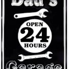 Dad's Garage Embossed Metal Novelty Parking Sign