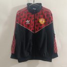 Manchester United Black with Red Zigzag Pattern 25/26 Windbreaker Jacket