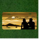Creative License Plate Auto Tag With Couple Looking At Ocean Boats And Sunset