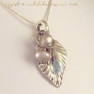 J O L I E - - FIne Silver Hand-Sculpted Leaf, Pearls and Swiss Blue Topaz on a Sterling Silver Chain