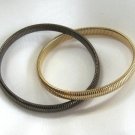 2 Slinky Flexible Gold And Charcoal Grey Bangle Bracelets Vintage 1980s 2 Slinky Flexible Gold And Charcoal Grey Bangle Bracelets Vintage 1980s