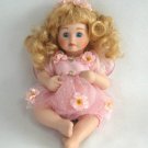 Porcelain Baby Girl Doll Curly Blonde Hair Pink Outfit Blue Eyes Delton Product Corp Porcelain Baby Girl Doll Curly Blonde Hair Pink Outfit Blue Eyes Delton Product Corp