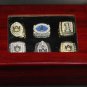A Set Auburn Tigers National Championship rings With Wooden Display Bo