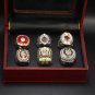A Set Clemson Tigers National Championship rings With Wooden Display B