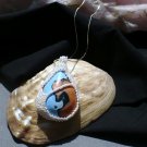 Seed beaded bezel tear drop focal