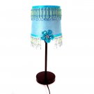 Turquoise and lime-green lamp