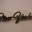 1976 77 78 CHRYSLER NEW YORKER GOLD SCRIPT EMBLEM #4022351 W/ STUDS 1976 77 78 CHRYSLER NEW YORKER GOLD SCRIPT EMBLEM #4022351 W/ STUDS