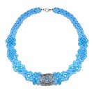 handmade light blue beads and crystals and silver crocheted ring necklace