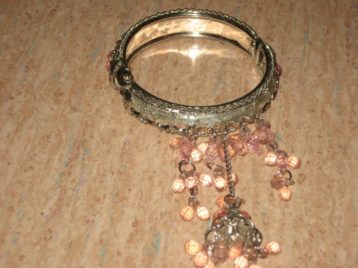 silver bracelet with pink beeds