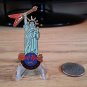 Hard Rock Cafe New York Statue of Liberty holding red flying V Guitar Pin