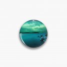 Ice on the lake shore and northern lights landscape Pin