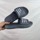 Collection 85 Adilette Alpha slippers, classic black and white color scheme+three