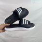 Collection 85 Adilette Alpha slippers, classic black and white color scheme+three