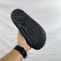 eighty Break Slide slippers, simple black and white color scheme, synthetic leathe