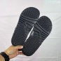 ninety-five Hydro 12 slippers, made of white synthetic leather and gold Flyman log