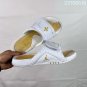 ninety-five Hydro 12 slippers, made of white synthetic leather and gold Flyman log_3899