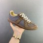 one hundred and fiftyMaison Margiela training shoesThe top layer of the shoe is made o