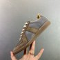 one hundred and fiftyMaison Margiela training shoesThe top layer of the shoe is made o