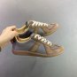 one hundred and fiftyMaison Margiela training shoesThe top layer of the shoe is made o