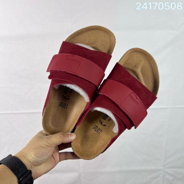 one hundred and fiveBirkenstock black double strap sandals, made in Germany, with a sued