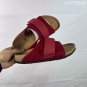one hundred and fiveBirkenstock black double strap sandals, made in Germany, with a sued