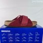 one hundred and fiveBirkenstock black double strap sandals, made in Germany, with a sued