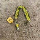 Yellow With Crystal Beads And A skull Charm