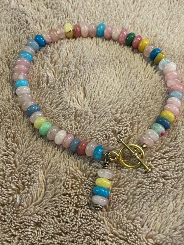 Cotton Candy Colored Bracelet With A Small Tassel