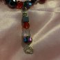 Red Beaded Necklace With A Charm
