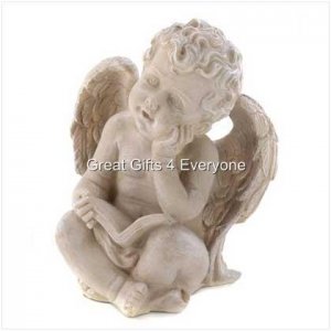 READING CHERUB FIGURINE