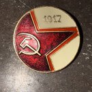 Former USSR insignia, commemorating the communist revolution