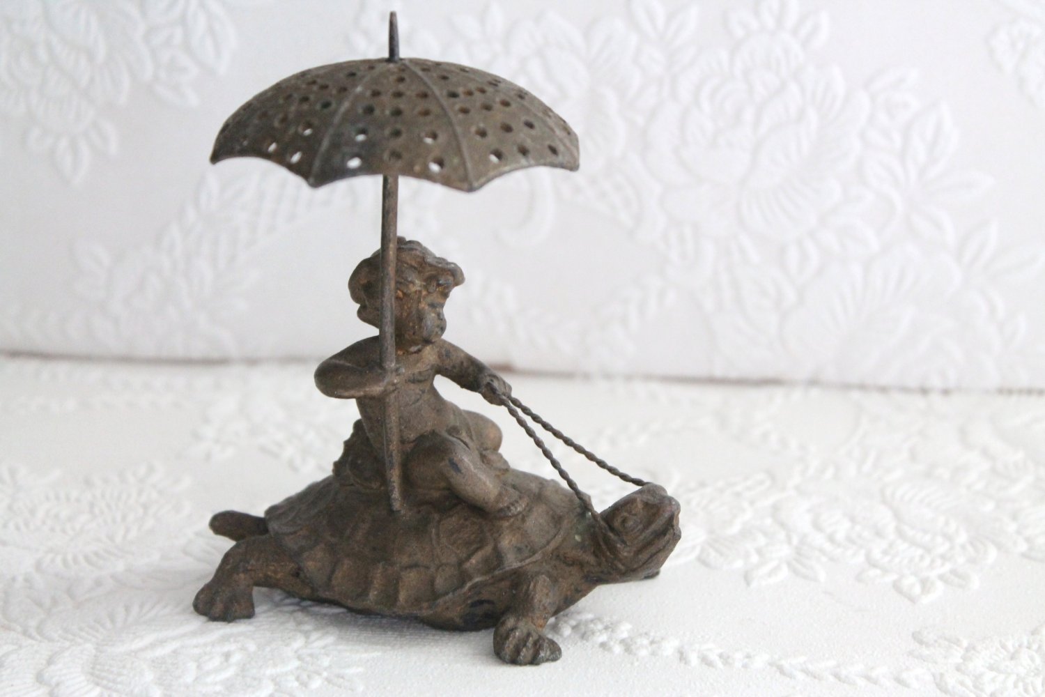 Antique Pairpoint Cherub Holding Umbrella Riding Turtle or Tortoise