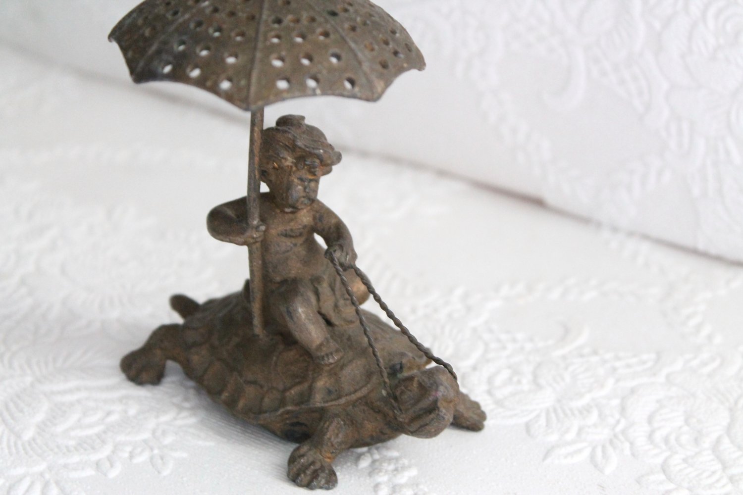 Antique Pairpoint Cherub Holding Umbrella Riding Turtle or Tortoise