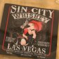 Sin City Las Vegas Whisky bottle. Flattened (slumped) bottle