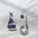 Three-dimensional brushed silver needle earrings
