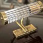 Vintage Mid Century Modern Brass Picture Light Glass Rod Shade Curved Arm Lamp