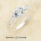 STERLING SILVER- ROUND BLUE TOPAZ WITH TRIPLE  WHITE TOPAZ SIDE STONES **FREE SHIPPING**