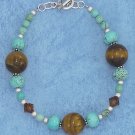 STERLING SILVER  TOGGLE BRACELET WITH TURQUOISE AND TIGER EYE BEADS