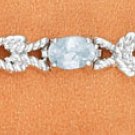 STERLING SILVER BLUE TOPAZ BRACELET W/ ROPE DESIGN