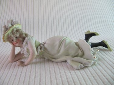Vintage Bisque Porcelain Handpainted Figurine Woman Reclining Fancy Lace Dress & Hat Foot Raised