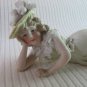 Vintage Bisque Porcelain Handpainted Figurine Woman Reclining Fancy Lace Dress & Hat Foot Raised
