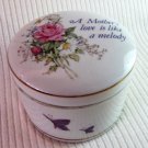 Vintage Porcelain A Mother's Love is Like a Melody Round Music Box Plays Shadow of Your Smile 3-in
